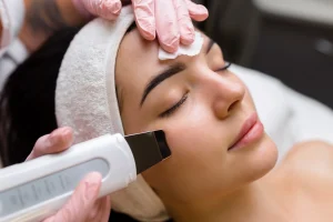 Woman enjoying HydraFacial at personal wellness spa