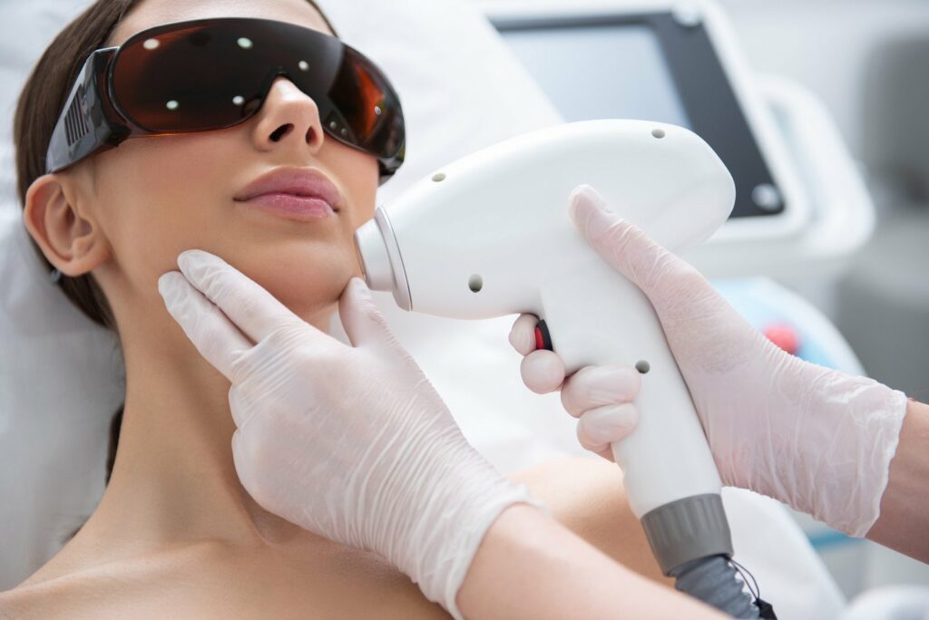 Woman Undergoing Facial Treatment
