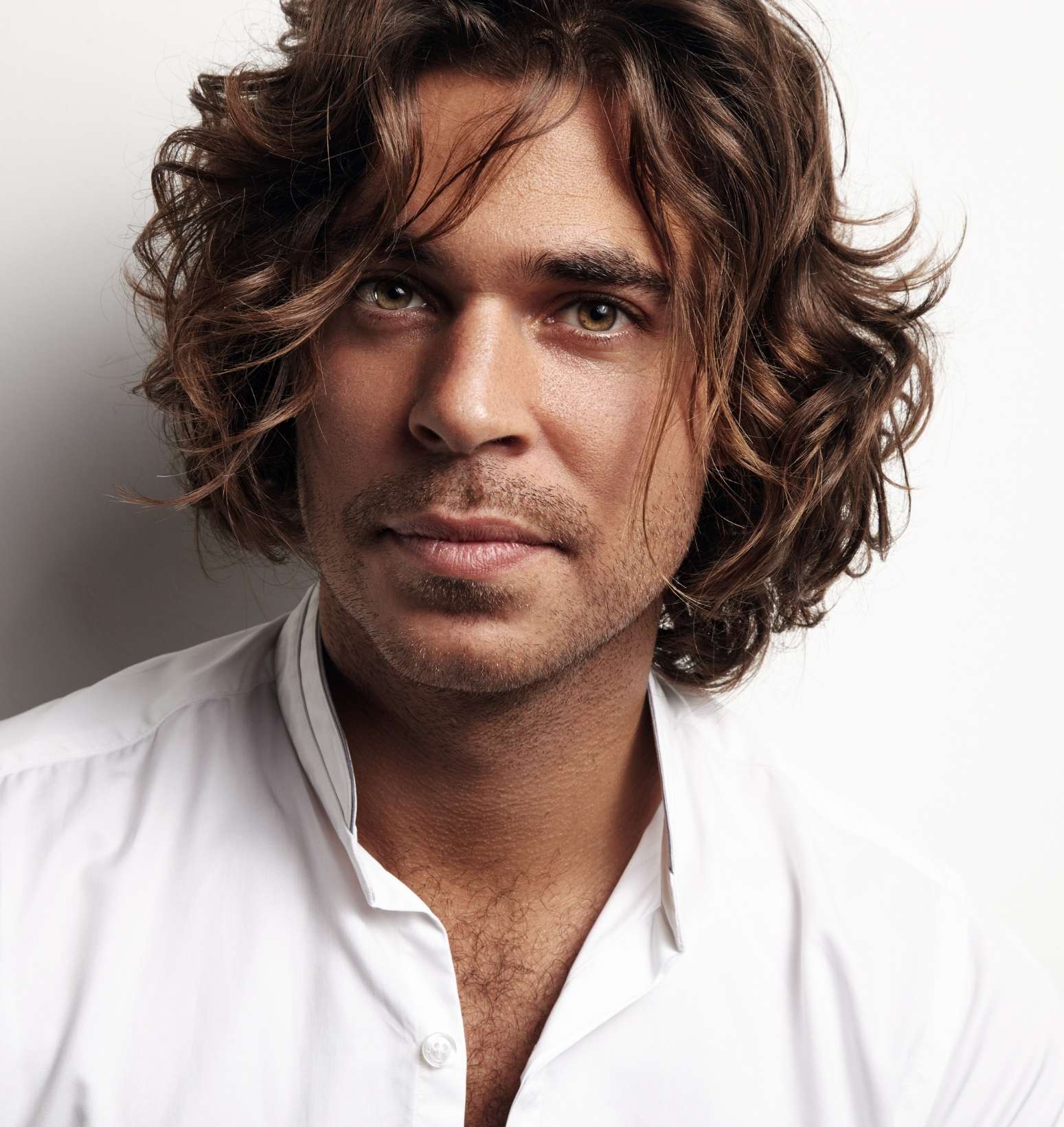 Man with healthy scalp and hair using Keravive treatment