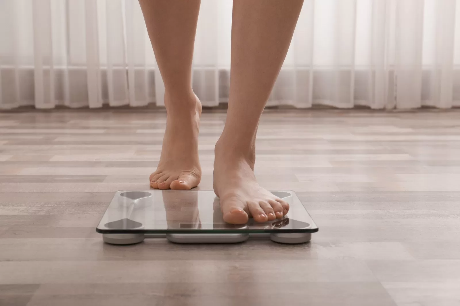 woman particiapting in weight loss program, working with a medical weight loss clinic